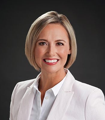 Portrait of Caitlin Kashef, Associate Broker.